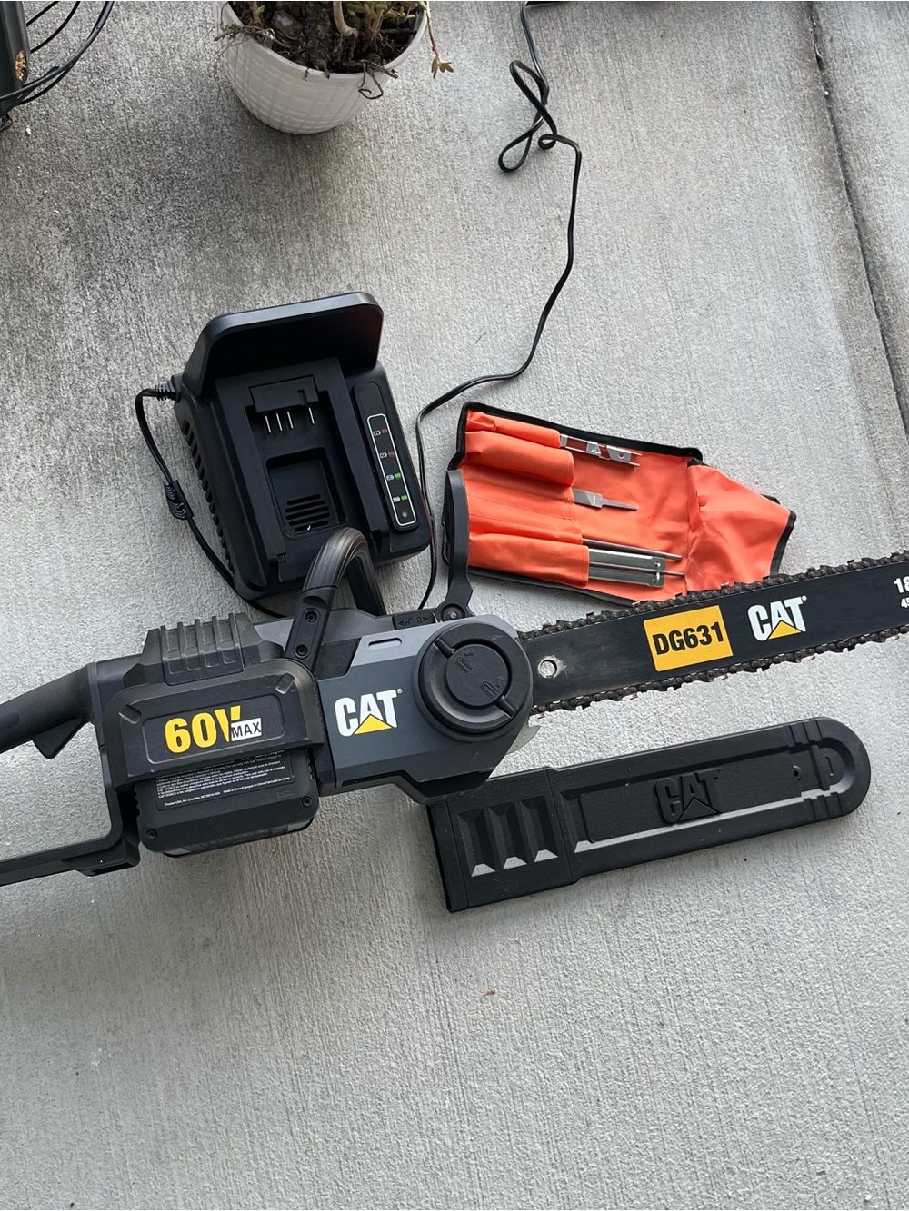 Caterpillar Black and Yellow 60V Max Cordless Chainsaw with Charger